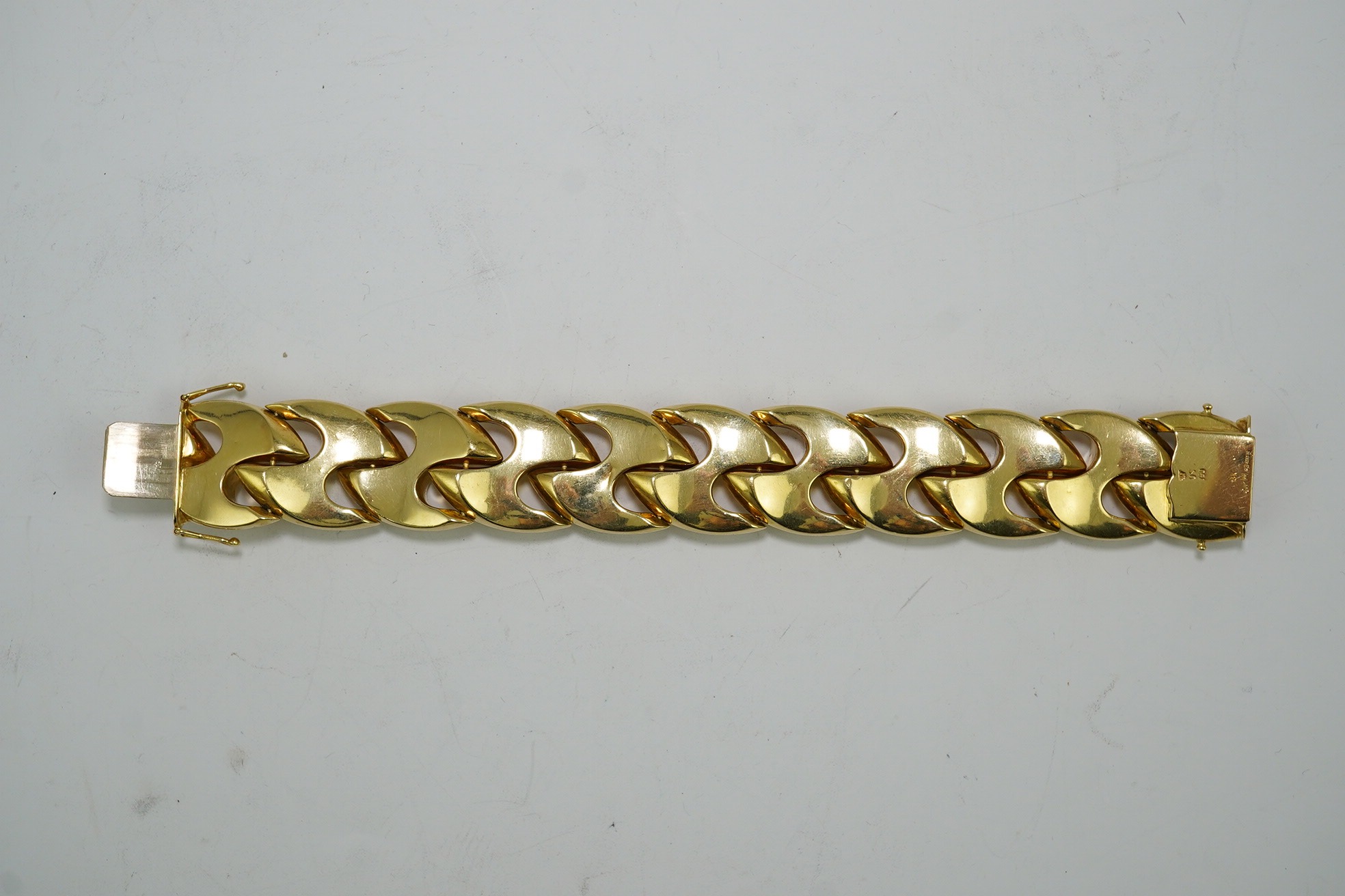 A stylish early 1970's brushed 18ct gold bracelet